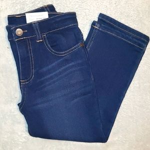 Dark Wash, knit denim skinny jean.